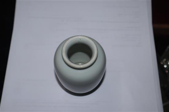 A Chinese small blue and white vase painted with a luohan H.10cm
